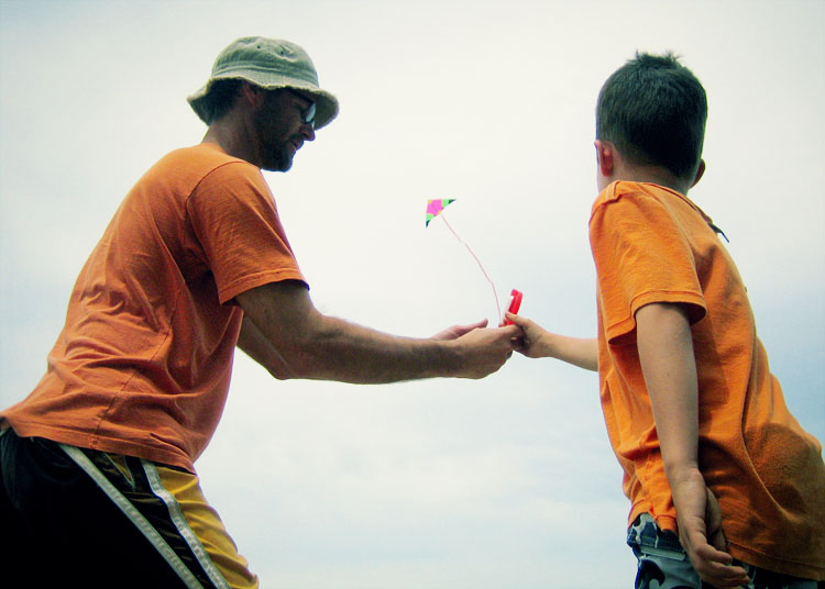 father, son and kite