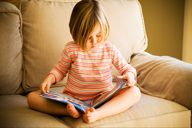 reading on the sofa