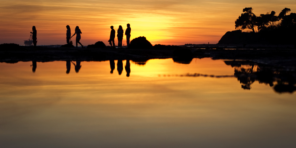 tide pooling at sunset