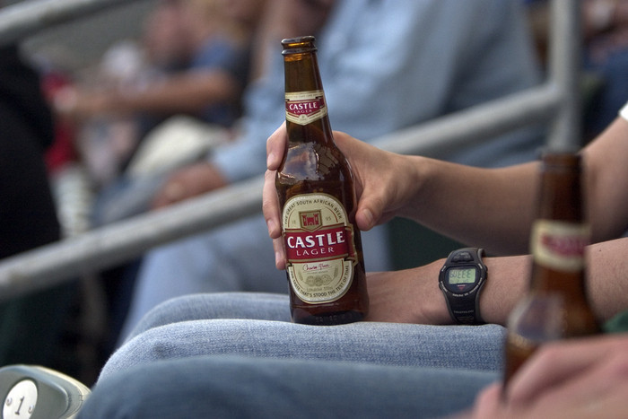 castle lager: somewhat dry, somewhat bitter, never sweet.