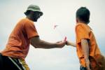 father, son and kite